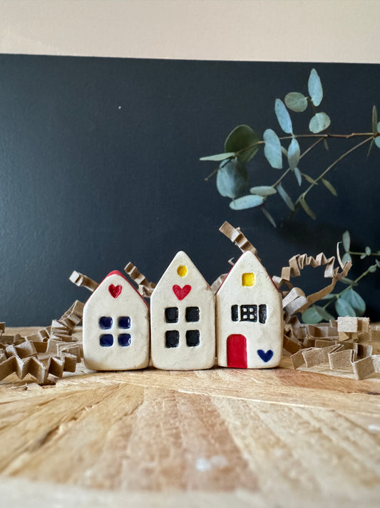 Mini houses: “It takes a village”