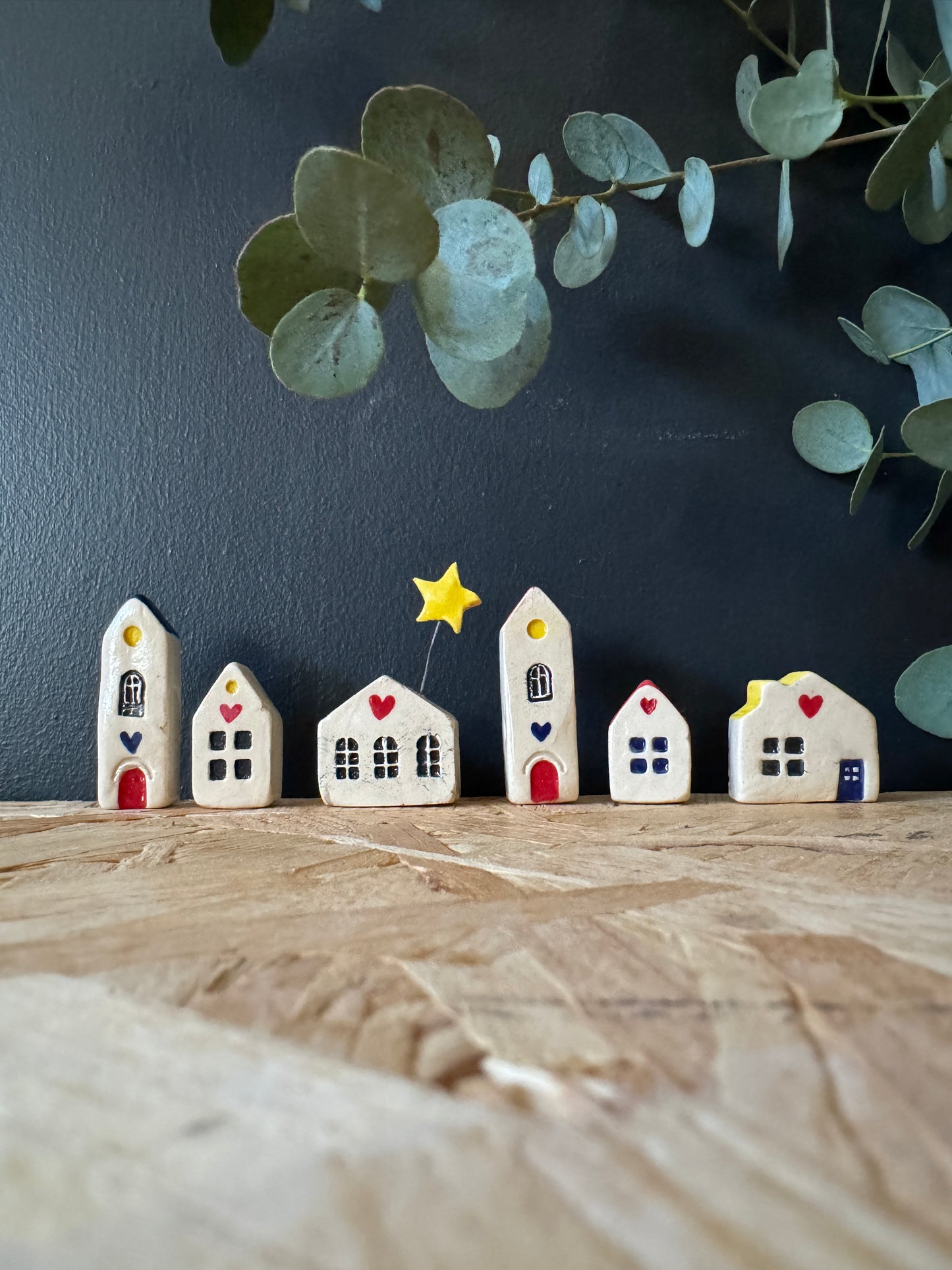 Mini houses: “It takes a village”